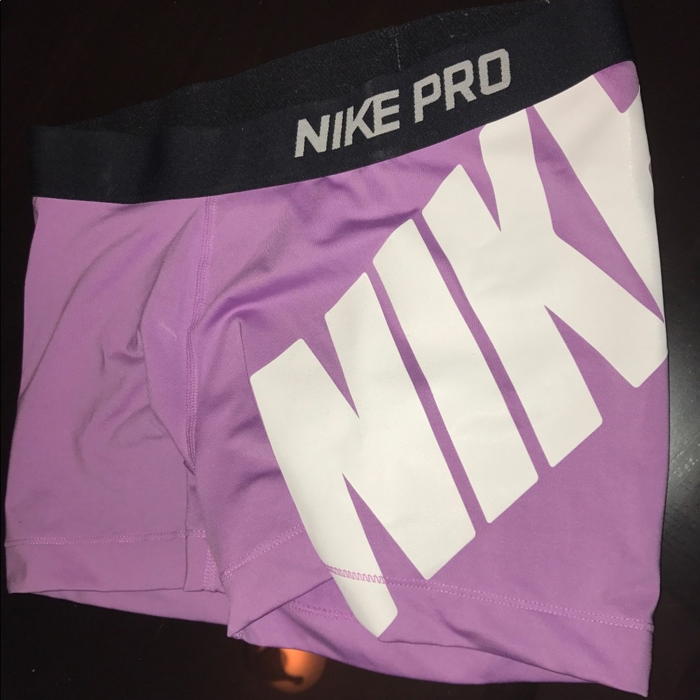 PURPLE NIKE PROS  NIKE SYMBOL, discontinued item